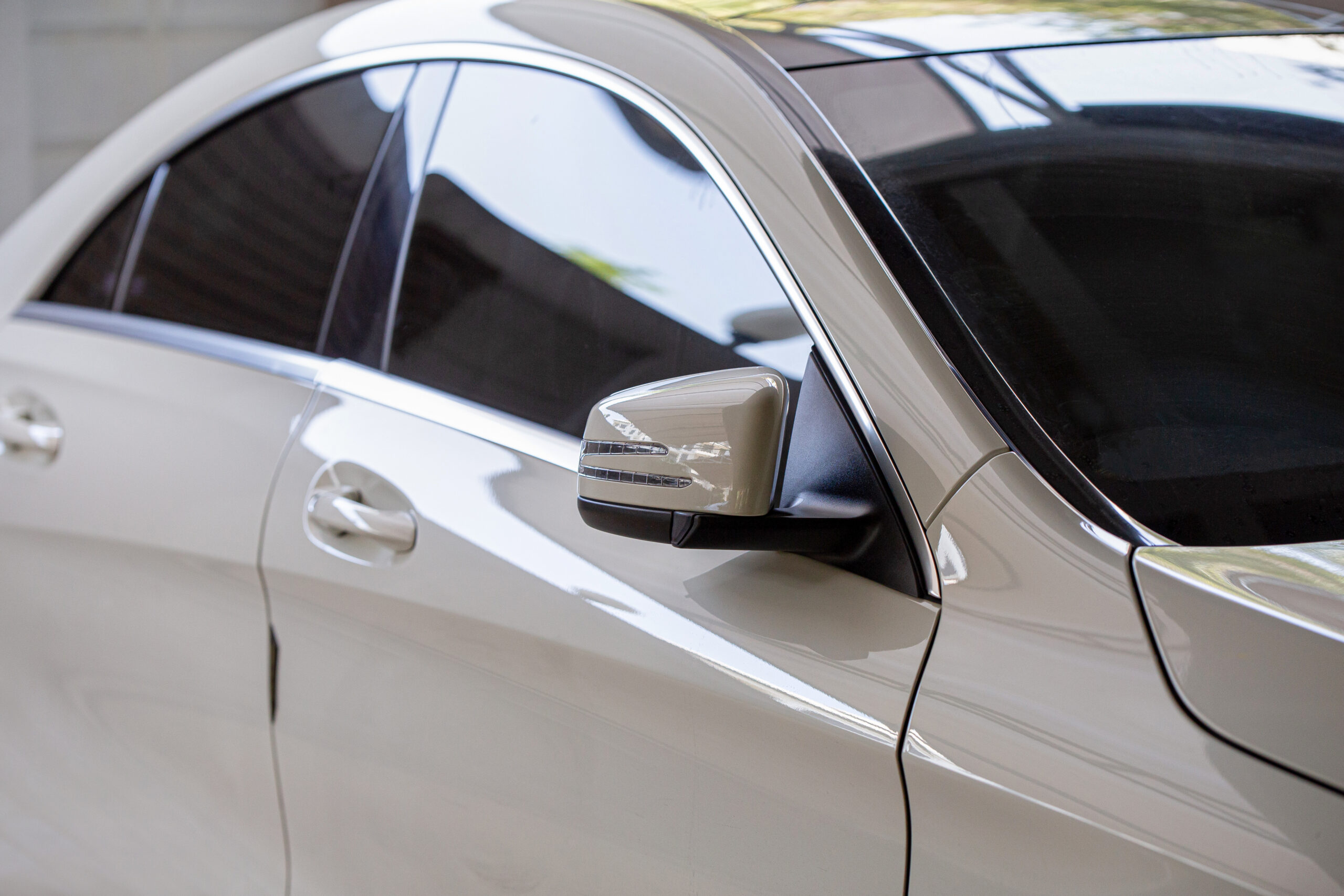 Rear-view mirror or door mirror closed for safety at car park, S